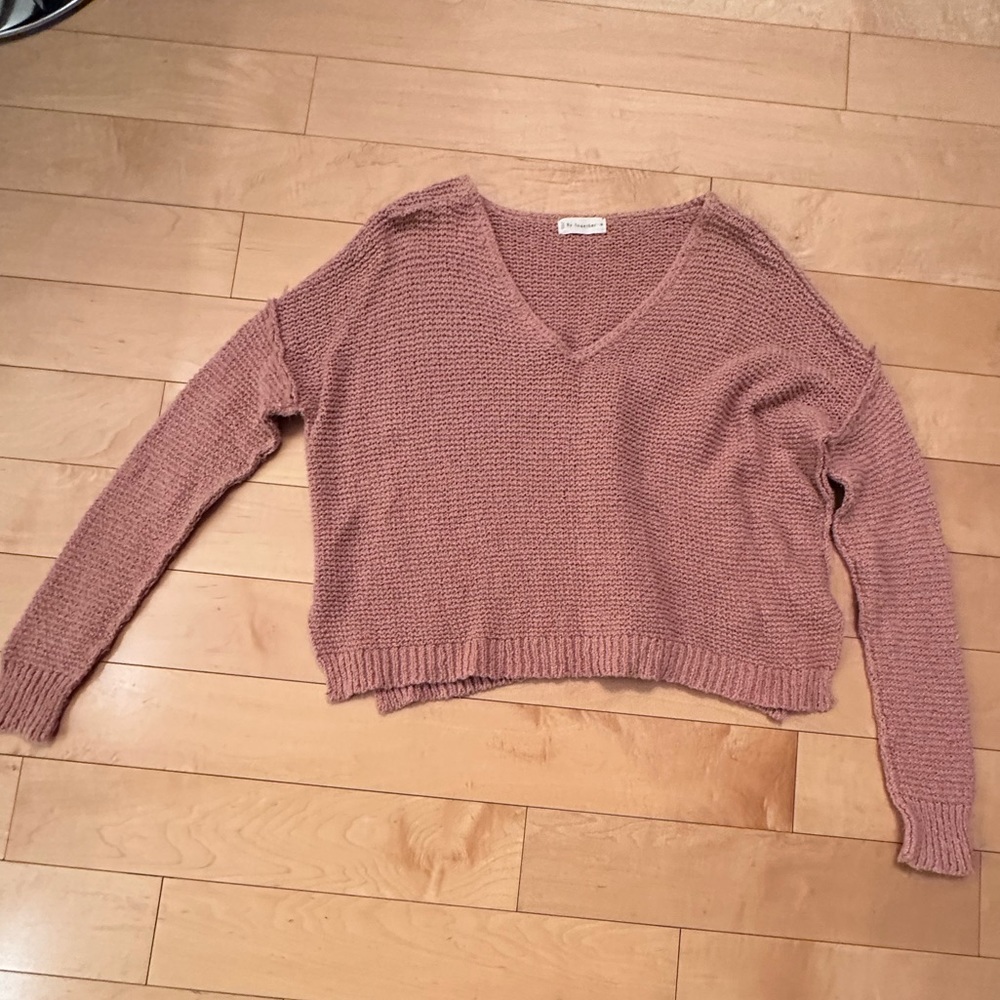 Pink v-neck knit sweater